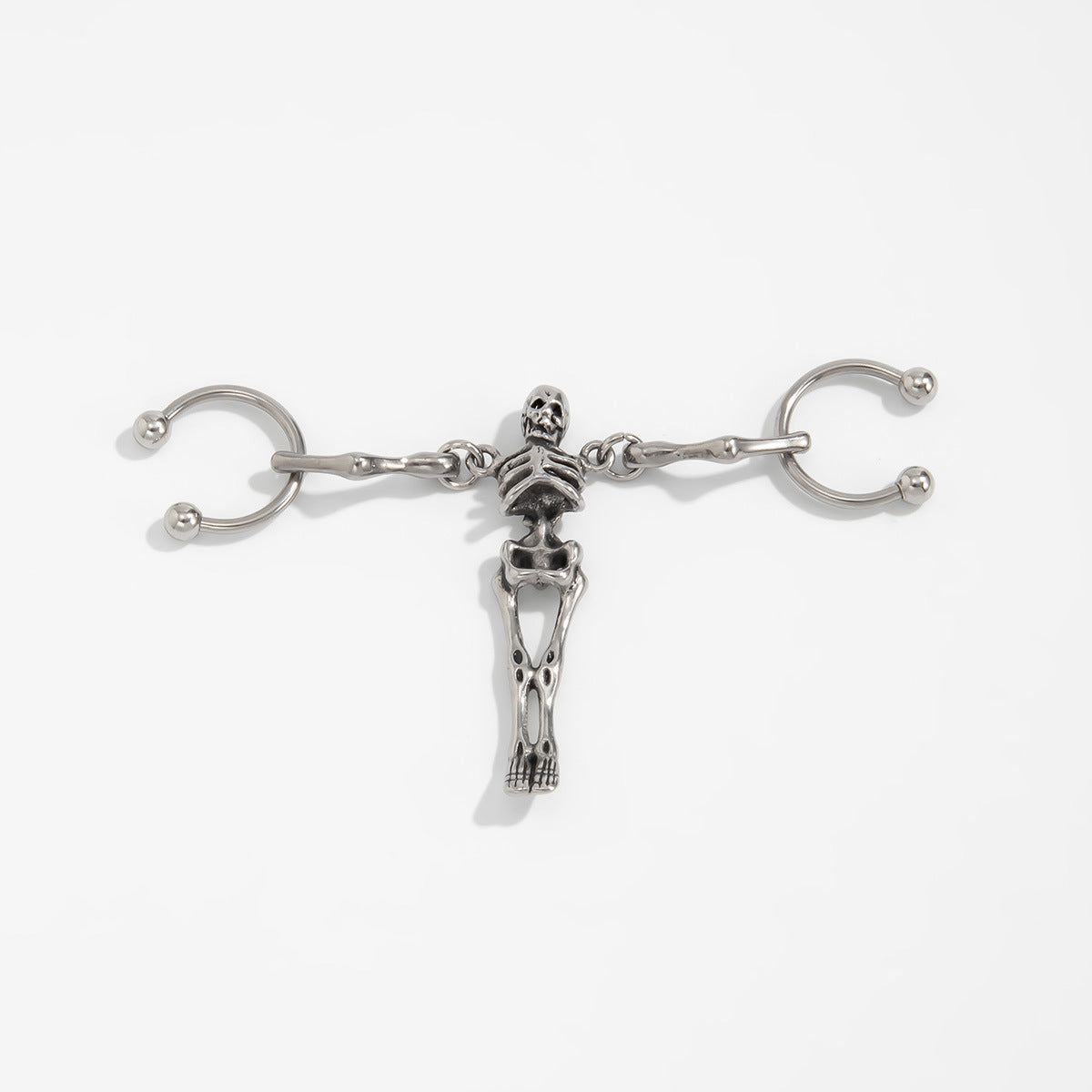 Wholesale Sweet and cool titanium steel skull ear bone earrings